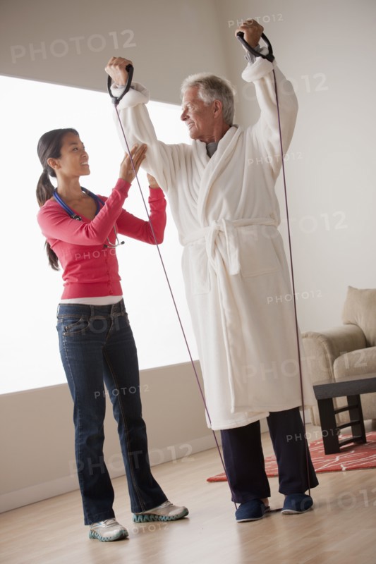 Female nurse with senior patient at home. 
Photo: Rob Lewine