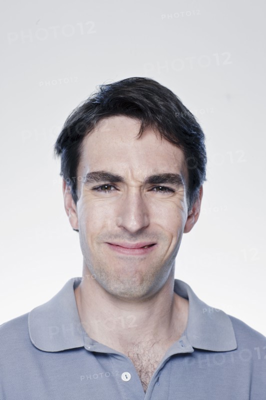 Portrait of confused man, studio shot. 
Photo : Rob Lewine