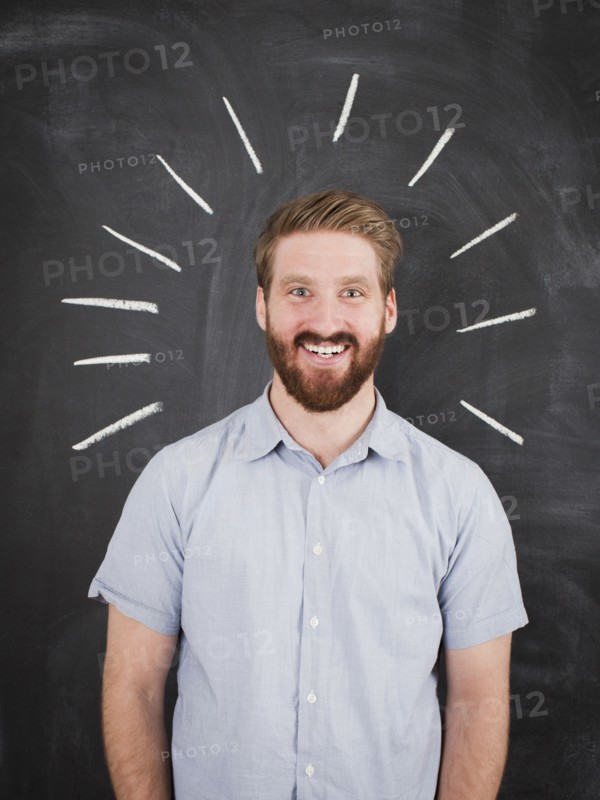 Young man with chalk lines around head, studio shot. 
Photo: Jessica Peterson