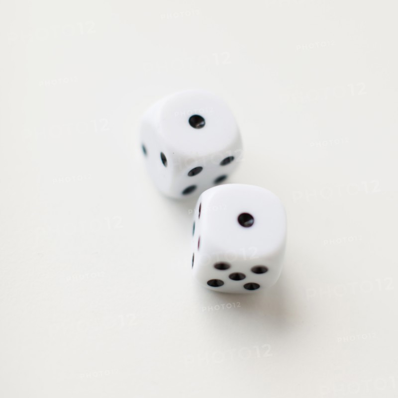 Dices on white background, studio shot. 
Photo: Jessica Peterson