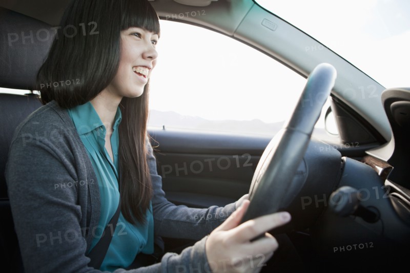Portrait of young woman in car. 
Photo : Jessica Peterson