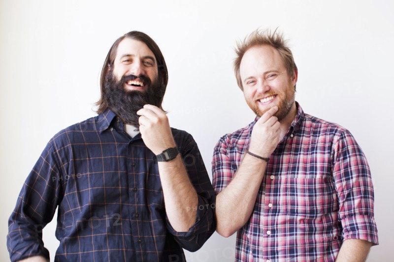 Two bearded males posing together with hands on chins. 
Photo: Jessica Peterson