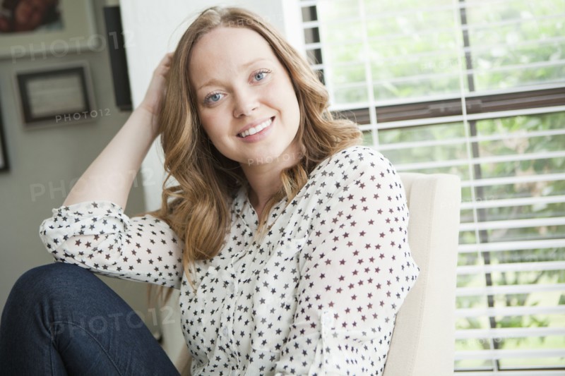 Portrait of happy young woman. 
Photo: Jessica Peterson