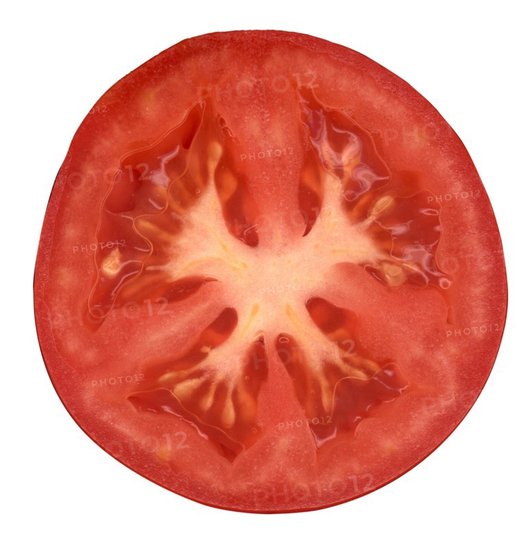 Half of tomato on white background. 
Photo: Calysta Images