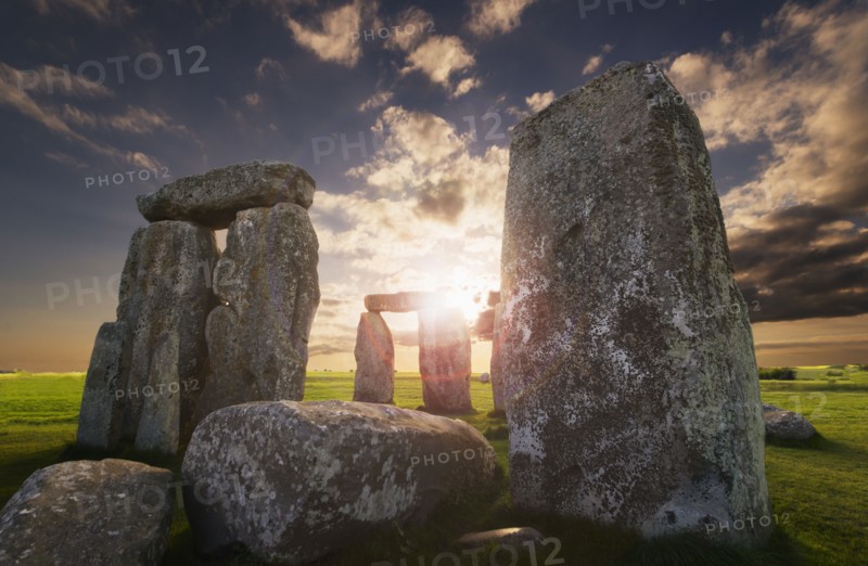 UK, England, Wiltshire, Stonehenge at sunset.
