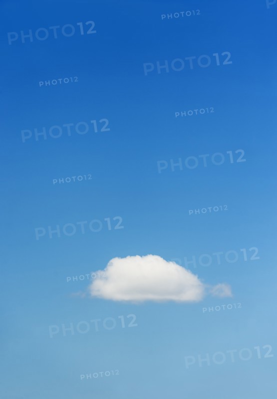Blue sky with single cloud.
