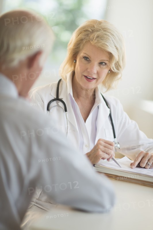 Female and male doctors talking.