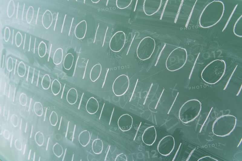 Binary code on blackboard.
