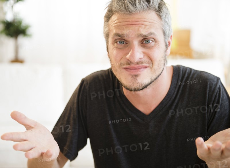 Confused mid adult man . Photo: Jamie Grill