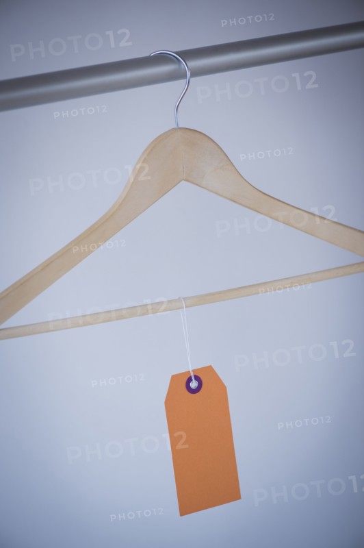 Studio shot of hanger with price tag. Photo : Daniel Grill