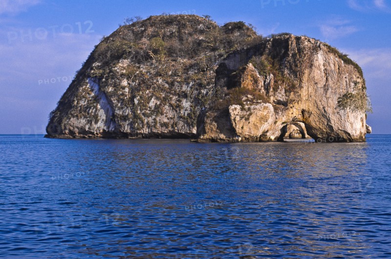 Mexico, Jalisco, Puerto Vallarta, View of rock at Banderas Bay. Photo: DKAR Images