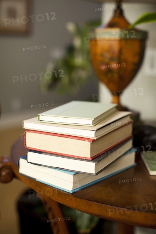 Stack of books on table. Photo : Jessica Peterson