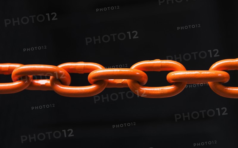 Chain on black background, studio shot.