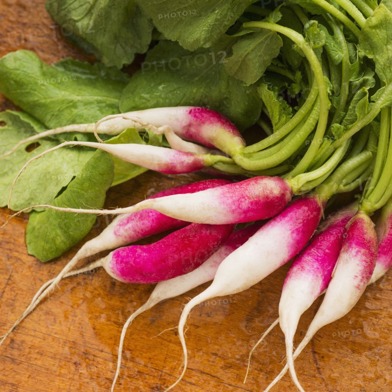 French radish on wood pattern, studio shot.