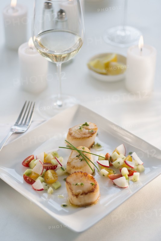 Seafood on plate in restaurant.