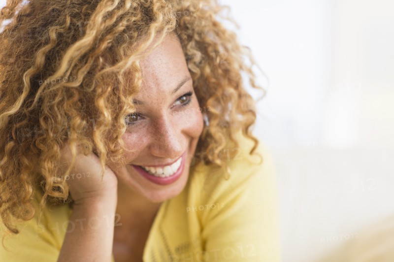 Portrait of smiling young woman.
