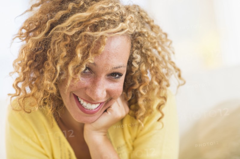 Portrait of smiling young woman.