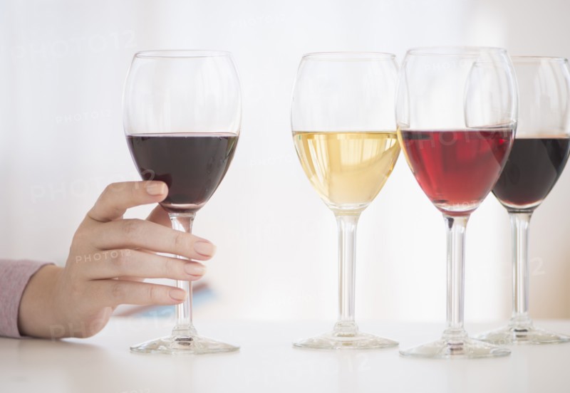 Glasses with red, rose and white wine.