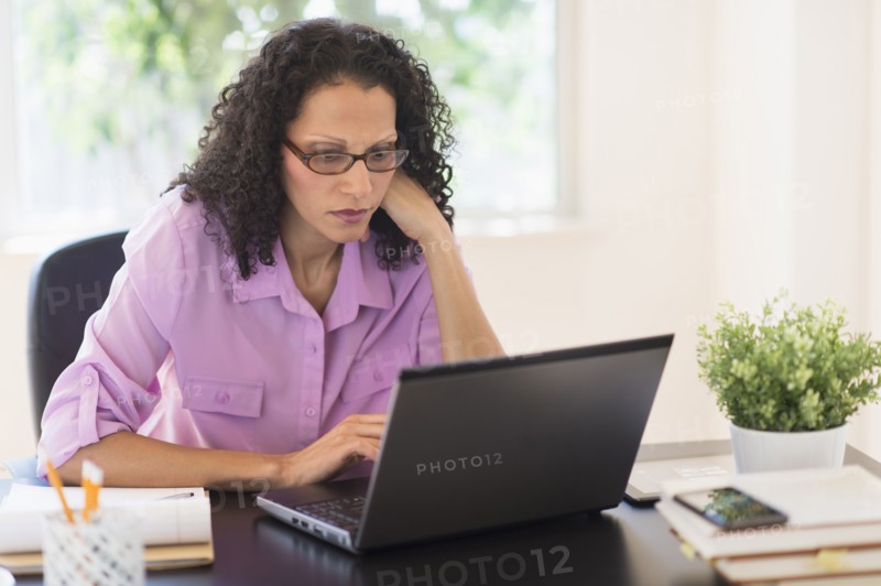 Woman working in office.