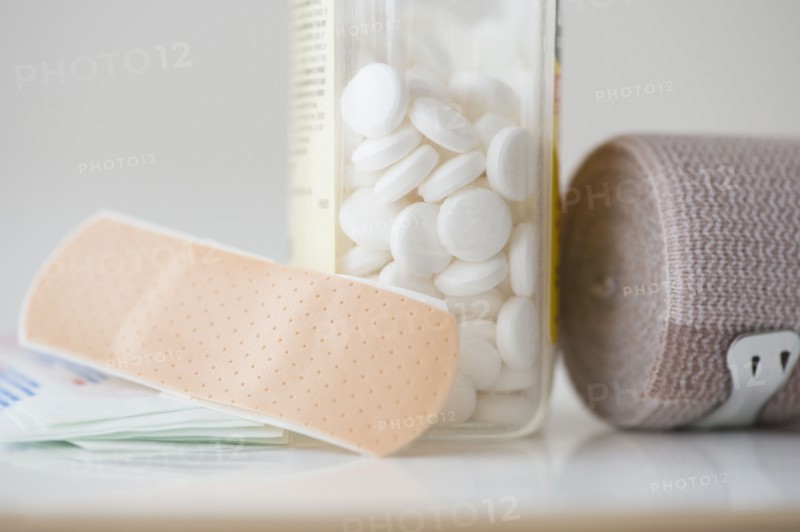 Studio shot of pills, bandage and adhesive bandage. Photo: Jamie Grill