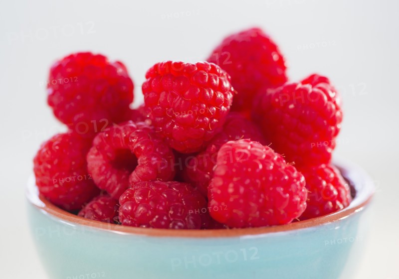 Bowl filled with fresh raspberries. Photo: Daniel Grill