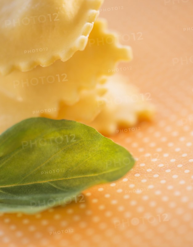 Studio Shot of ravioli and basil leaf. Photo : Daniel Grill