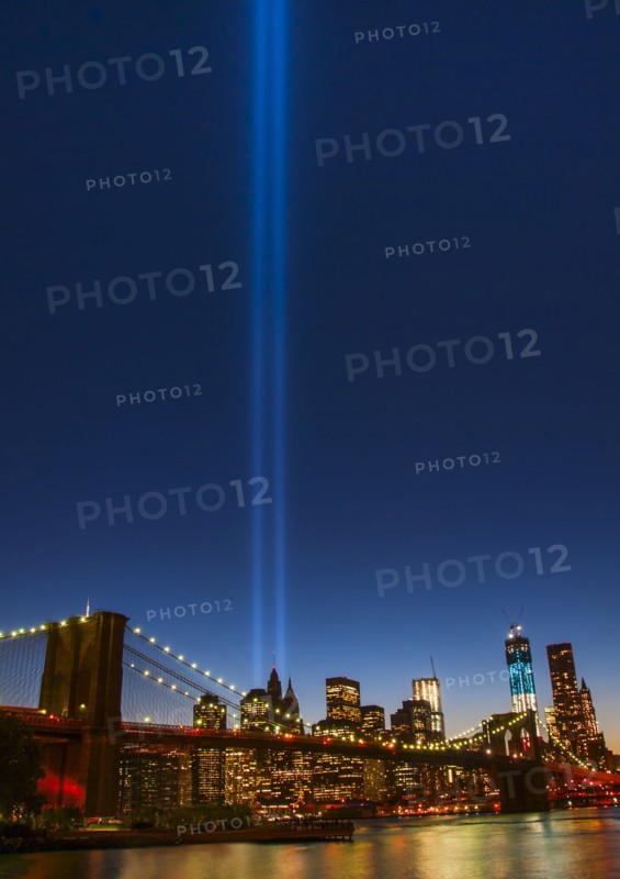 View over Hudson River towards Manhattan with September 11th memorial lights and Brooklyn Bridge. Photo: Daniel Grill