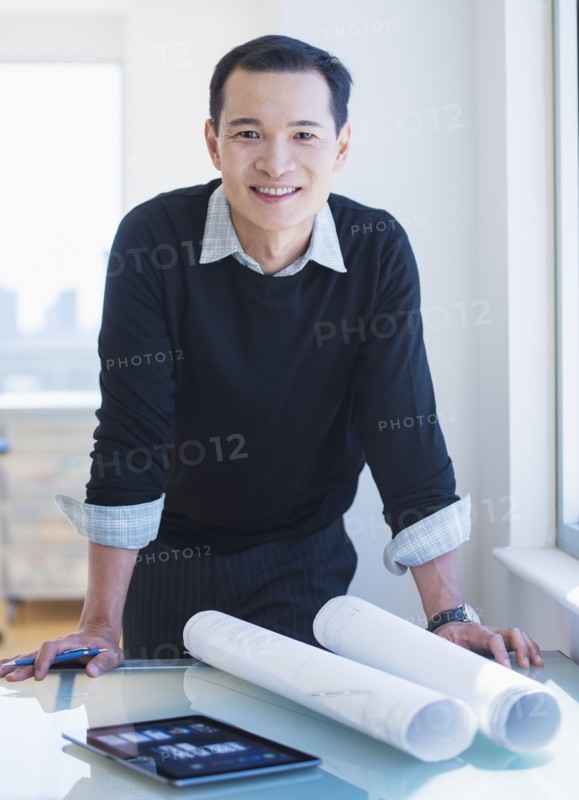 Mid adult architect working in his studio. Photo: Daniel Grill