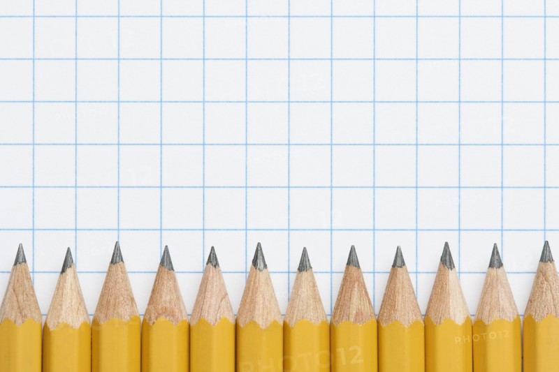 Row of sharpened pencils on graph paper, studio shot. Photo: Kristin Duvall