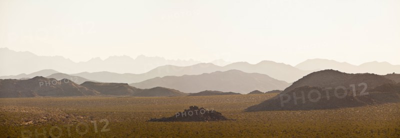 Several mountain ranges backlit by morning sun. Photo: Mike Kemp