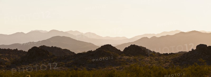 Several mountain ranges backlit by morning sun. Photo: Mike Kemp