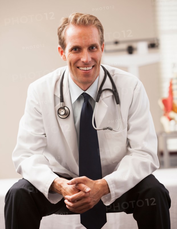 Portrait of doctor smiling. Photo : Mike Kemp