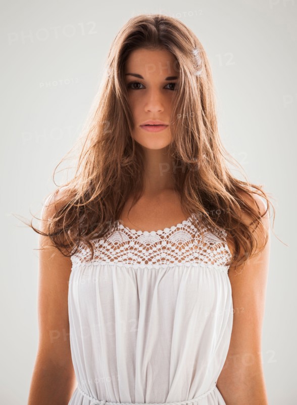 Beautiful woman staring into camera. Photo : Mike Kemp