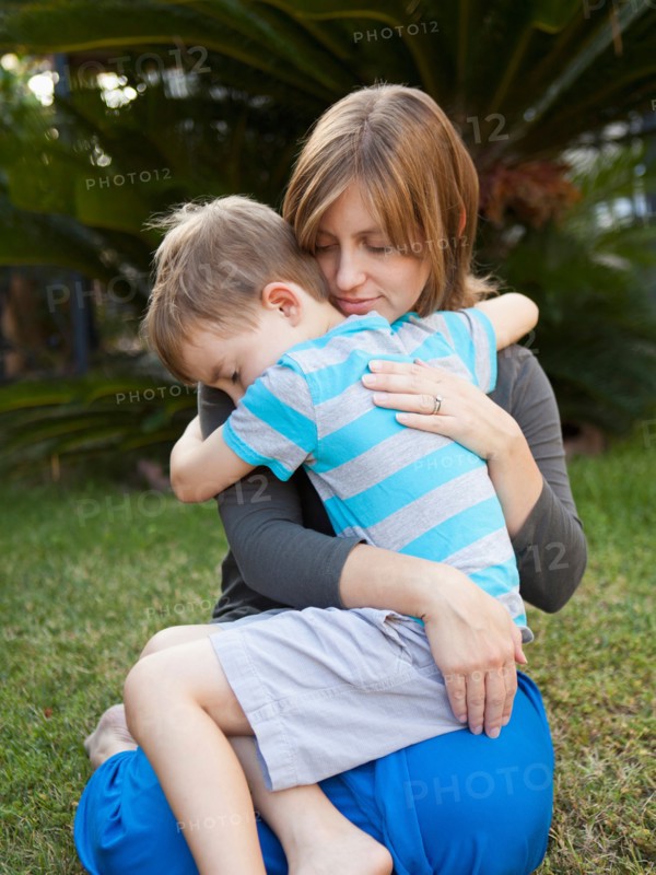 Mother hugging her son. Photo : Jessica Peterson