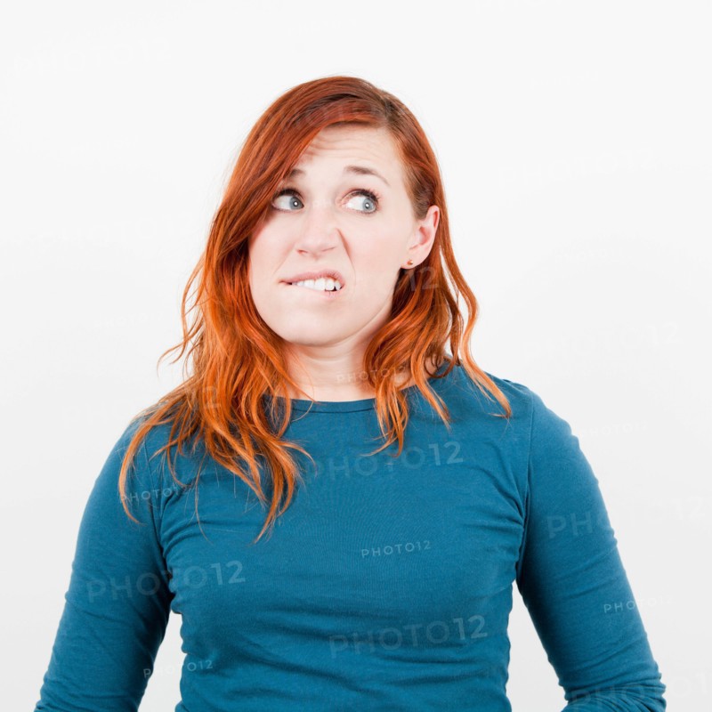 Studio shot, Portrait of woman being surprised. Photo: Jessica Peterson