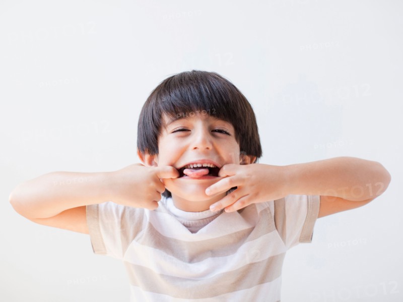 Studio Shot of young boy making grimace. Photo: Jessica Peterson