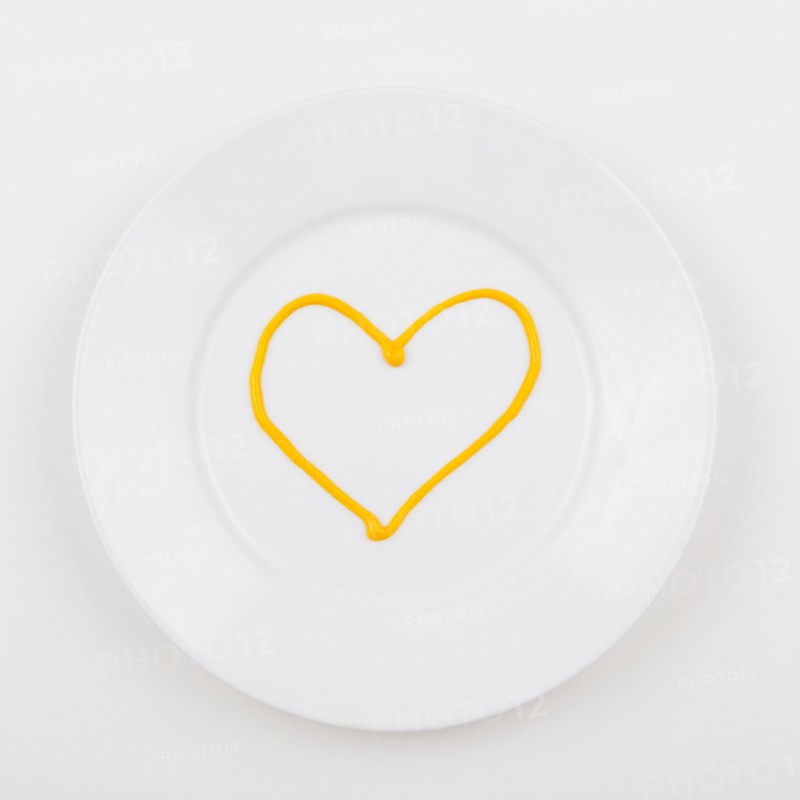 Plate with heart made of mustard. Photo: Jessica Peterson