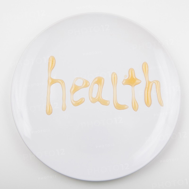 Word HEALTH on white plate. Photo: Jessica Peterson