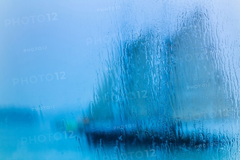 Schooner seen through wet window. Portland, Maine.