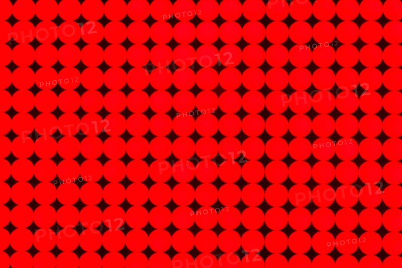 Spotted red and black background.