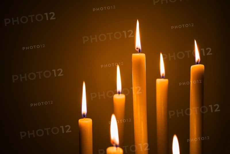 Studio shot of burning candles.