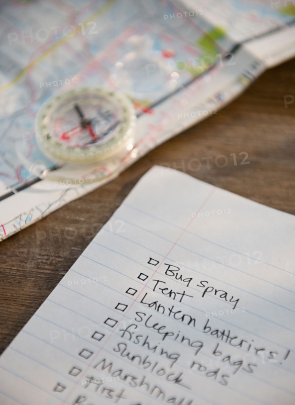 Packing list, compass and map