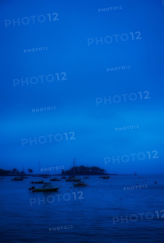 Boat on sea at dusk