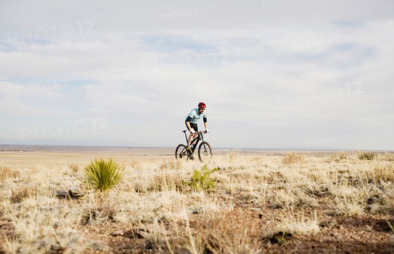 Male mountain biker on trail