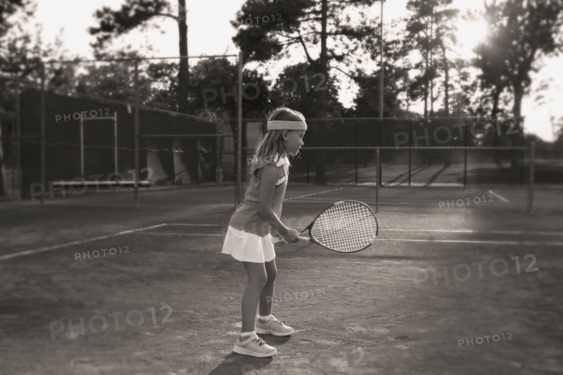 Girl playing tennis