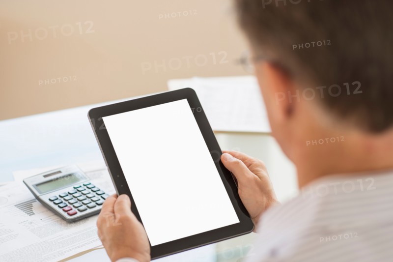 Man using tablet pc.