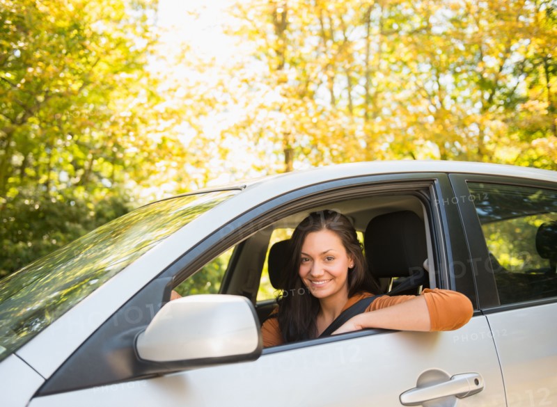 Woman driving car. Photo : Jamie Grill