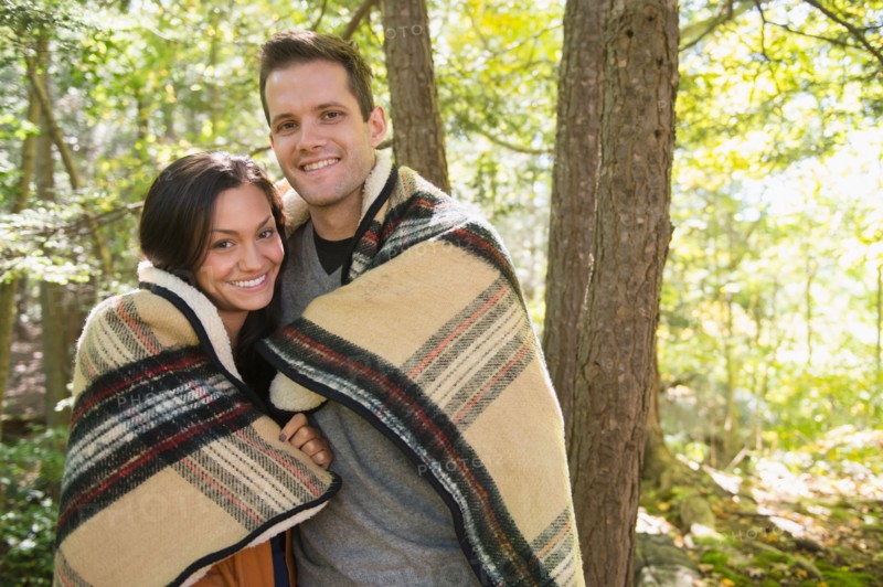 Portrait of couple in forest. Photo: Jamie Grill