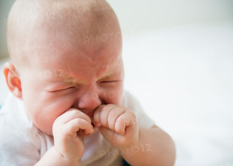 Baby boy (2-5 months) crying. Photo : Jamie Grill