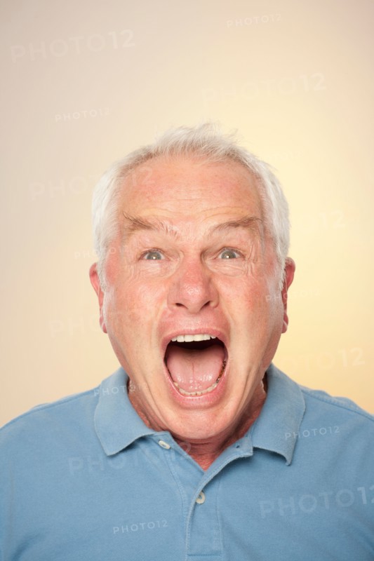 Portrait of senior man screaming. Photo : Rob Lewine